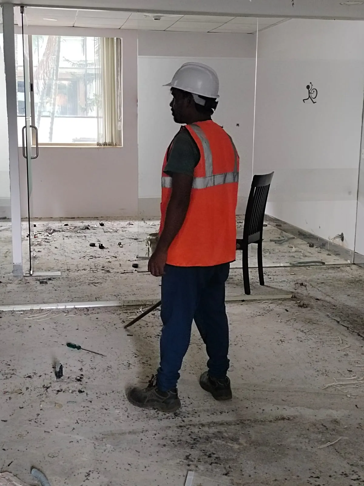 Professional technicians performing complete office dismantling services in Marathahalli inside a large commercial technology park